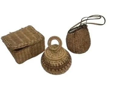A group of three woven baskets