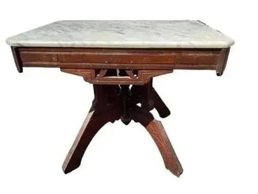 A Victorian walnut East lake marble top table