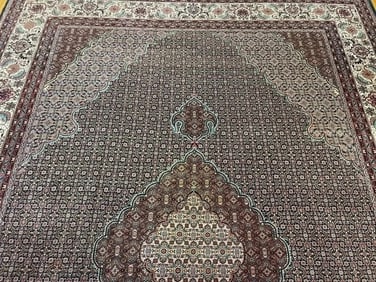 A room Size Tabriz Mahi design rug