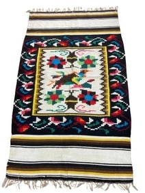 A Tribal Blanket flat woven wool rug