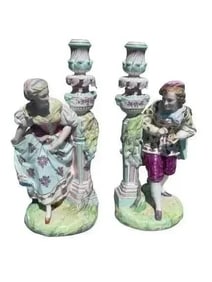 Pair of antique European porcelain figurine candle holders