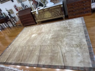A Tibetan handwoven wool room size rug