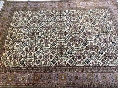 A Persian Tabriz rug