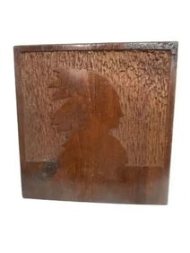A hand carved American Indian profile wood plaque