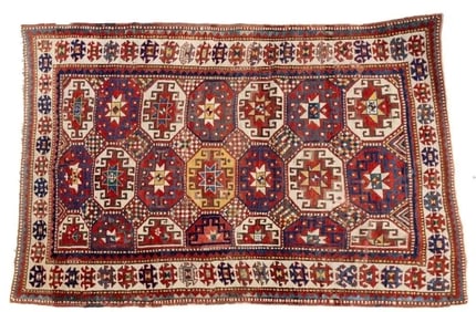 Antique Caucasian Moghan Kazak rug