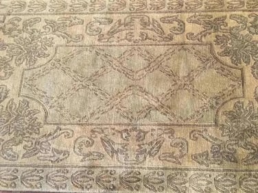 A contemporary Nepalese hand woven wool rug