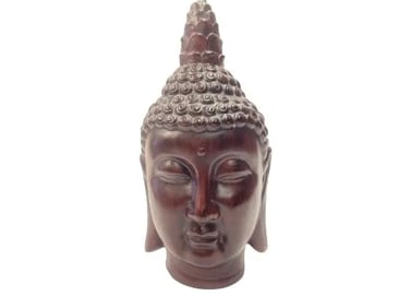 A large Buddha head pottery