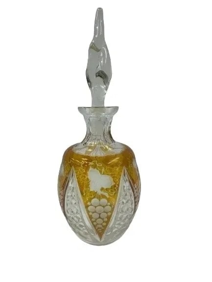 A Bohemian Czech Amber to clear Cut Glass Bottle: A Bohemian Czech Amber to clear Cut Glass Bottle standing 12 inches long.