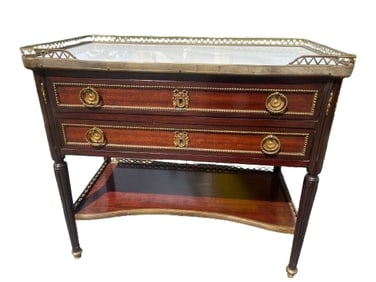 A Louis XVI style Bronze mounted Mahogany marble top table