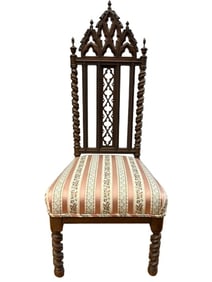 Antique English Gothic side chair with highly ornate Twist carvings and short legs.