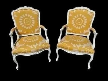 A Pair of French style arm chairs