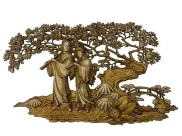 A large Asian decorative wall hanging sculpture art work