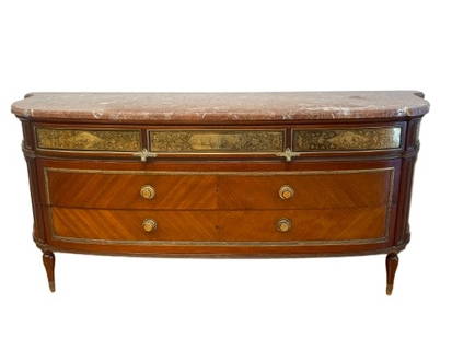 A Louis XVI style bronze mounted mahogany Commode after Jean Francois Leleu: A Louis XVI style gilt bronze mounted tulip wood and amaranth commode by the French Dutch company HERRAIZ after a royal model by Jean-Francois Leleu. Stamped twice Herraiz, Once on the bottom carcass