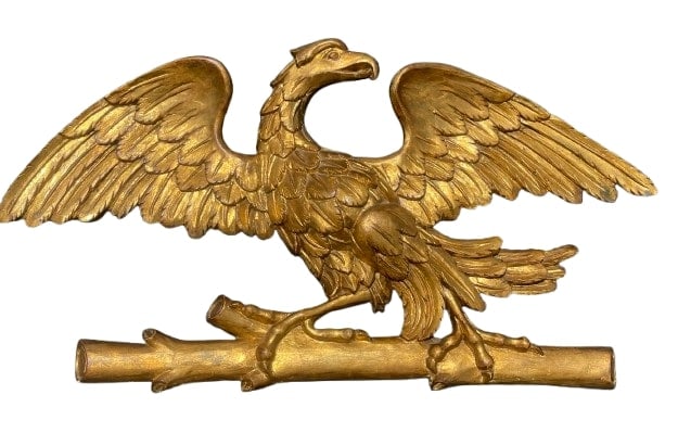 A Hand carved gilted Eagle with a wide wing span