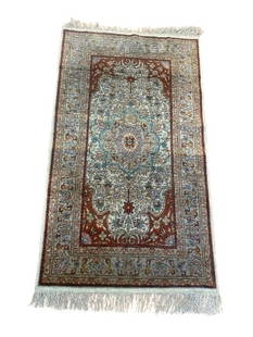 A Turkish Pure SILK hand woven rug: An old Turkish pure Silk handwoven rug measuring 2 feet 2 inches wide by 3 feet 10 inches long. A finely woven Turkish Silk on Silk hand knotted scatter rug.