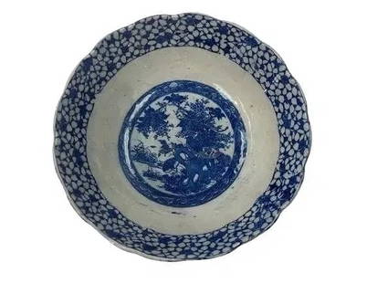 Antique Asian Porcelain blue & white  transferware Bowl: Antique Asian Porcelain blue & white transferware Bowl. Possibly a Japanese or Chinese transferware bowl.A stenciled Bowl 9 1/4 inches in Diameter. A decorative Punch Bowl, having elaborate floral & b
