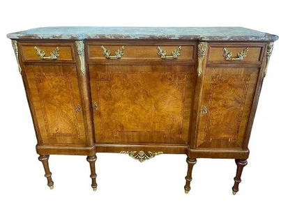 Antique French Louis XVI style Marble top Commode Cabinet: Antique French Louis XVI style Marble top Commode Cabinet. A unique European Cabinet measuring 22 inches deep by 55 1/2 inches wide and standing 42 inches tall. A highly decorative three door cabinet