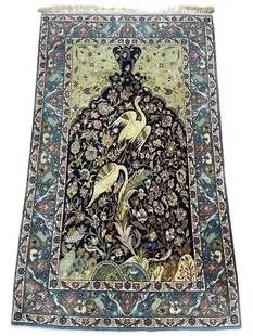 A Persian Isfahan finely woven silk & wool rug: A genuine Persian Isfahan finely woven rug. A silk foundation and wool pile Isfahan measuring 3 feet 4 inches wide by 5 feet 7 inches long.