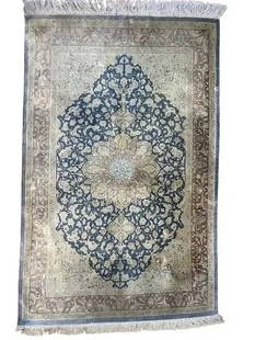 A Persian Pure Silk on Silk hand woven signed rug: A Persian Pure Silk on Silk hand woven signed rug measuring 3 feet 2 inches wide by 5 feet long. A finely woven genuine Persian Qum silk scatter rug. A Signed Qum JEDI rug.