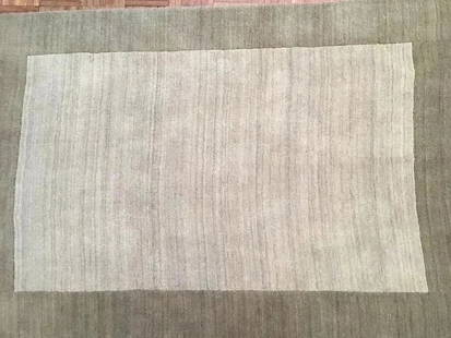 A Hand tufted contemporary Rug: A Hand tufted contemporary Rug. Size 3 ft 8 inches wide by 5 ft 3 inches long.