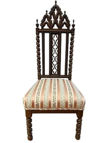 Antique English Gothic side chair with highly ornate Twist carvings and short legs.