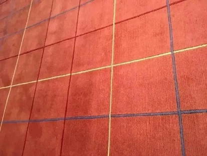 A handwoven Tibetan Contemporary wool rug: A hand woven Tibetan Contemporary wool rug Measuring 8 ft 2 inches wide by 11 ft 2 inches long.