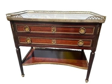 A Louis XVI style Bronze mounted Mahogany marble top table