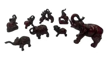 A collection of decorative elephant resin statues