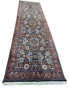 A Persian Bijar wool runner: A Persian Bijar wool runner measuring 2 feet 10 inches wide by 9 feet 10 inches long. A Genuine Persian Bijar handwoven rug with a wool pile & silk highlights on a cotton foundation.