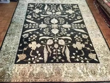 A handwoven Pakistan Chobi wool rug
