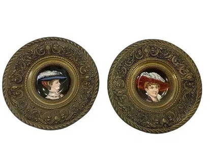Pair of German porcelain plate display chargers: Pair of German porcelain plate display chargers. A beautiful set of portrait charger porcelain plates housed in ornate round metal display frames. Each frame measuring about 16 inches in diameter and