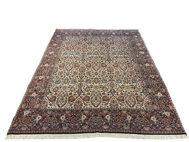 A Persian Bijar hand woven wool rug