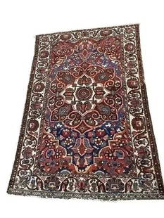 Antique Persian Bakhtiari Handwoven Rug: Antique Persian Bakhtiari Handwoven Rug measuring 4 feet 4 inches wide by 6 feet 7 inches long. A colorful tribal wool Persian Baktriari scatter rug.