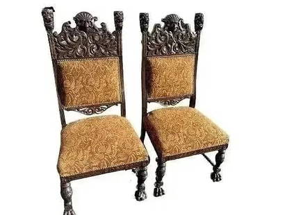 A Pair of European Gothic Renaissance chairs: A Pair of European Gothic Renaissance chairs measuring 21 inches wide x 18 inches deep x 47 inches tall x 19 inches seat height.