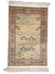 A pure Silk Turkish Hereke signed handwoven rug: A pure Silk Turkish Hereke signed handwoven rug measuring 2 feet 3 inches wide by 3 feet 5 inches long. A finely woven pure natural silk rug with an intricate all over floral design. Signed HEREKE in