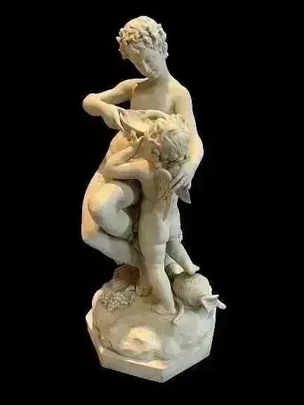 A fine European bisque porcelain statue: A fine bisque porcelain ,subject of a young man giving water to a Cherub. Unknown artist, stamped 1284 in the back with a matte appearance and texture to the touch. 19 inches tall.