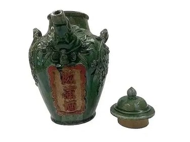 A large Chinese glazed pottery wine kettle jug