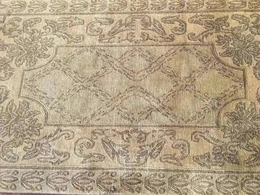 A contemporary Nepalese hand woven wool rug