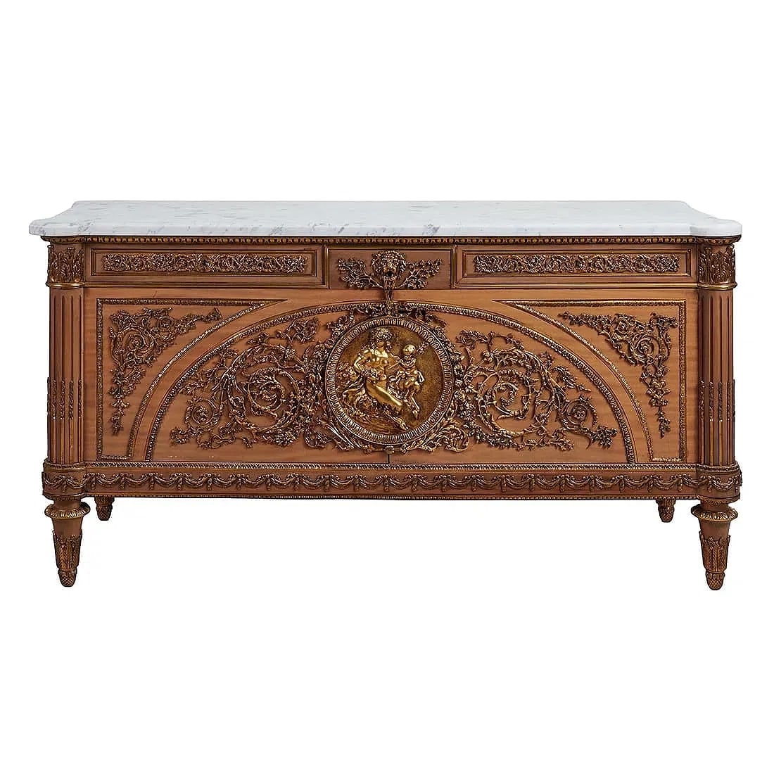A Louis XVI style gilt bronze mounted mahogany marble top commode A Vantaux: A French Louis XVI style gilt bronze mounted fine mahogany commode a Vantaux after the original model by Joseph Stockel and Guillaume Benneman. Diemensions of Height: 36 1/2 inches X Width: 71 inches