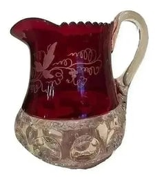 A Red & Clear Indiana Kings Crown glass pitcher