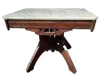 A Victorian walnut East lake marble top table
