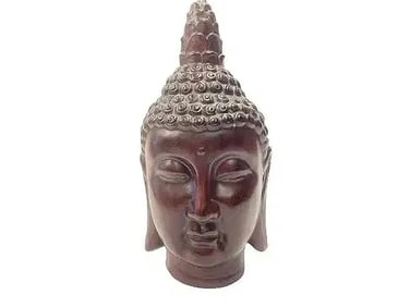 A large Buddha head pottery