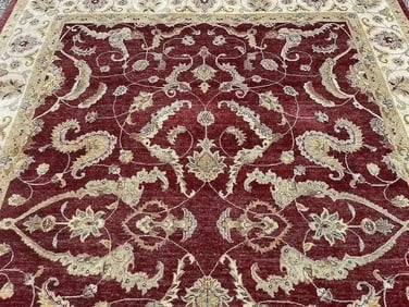 A handwoven room size oriental rug
