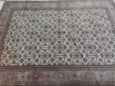 A Persian Tabriz rug