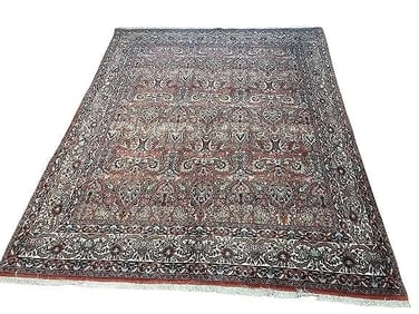 A Persian Bijar hand woven wool rug