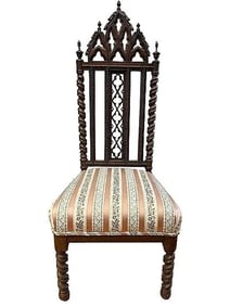Antique English Gothic side chair with highly ornate Twist carvings and short legs.