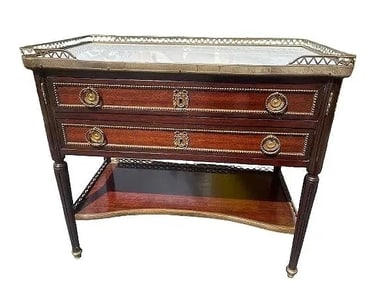 A Louis XVI style Bronze mounted Mahogany marble top table