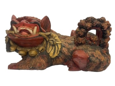 A Chinese hand carved FOO DOG wooden statue