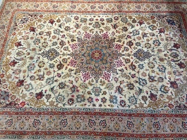 A Persian Tabriz rug