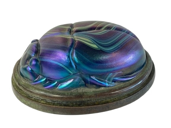 A Tiffany Studios large scarab turtleback favrille glass & bronze paperweight # 725: A Tiffany Studios large Bronze & Scarab Turtleback Favrille glass Paper weight.A Tiffany Studios Stamped oval shape turtle back iridescent glass scarab beetle. Stamped TIFFANY STUDIOS NEW YORK with th
